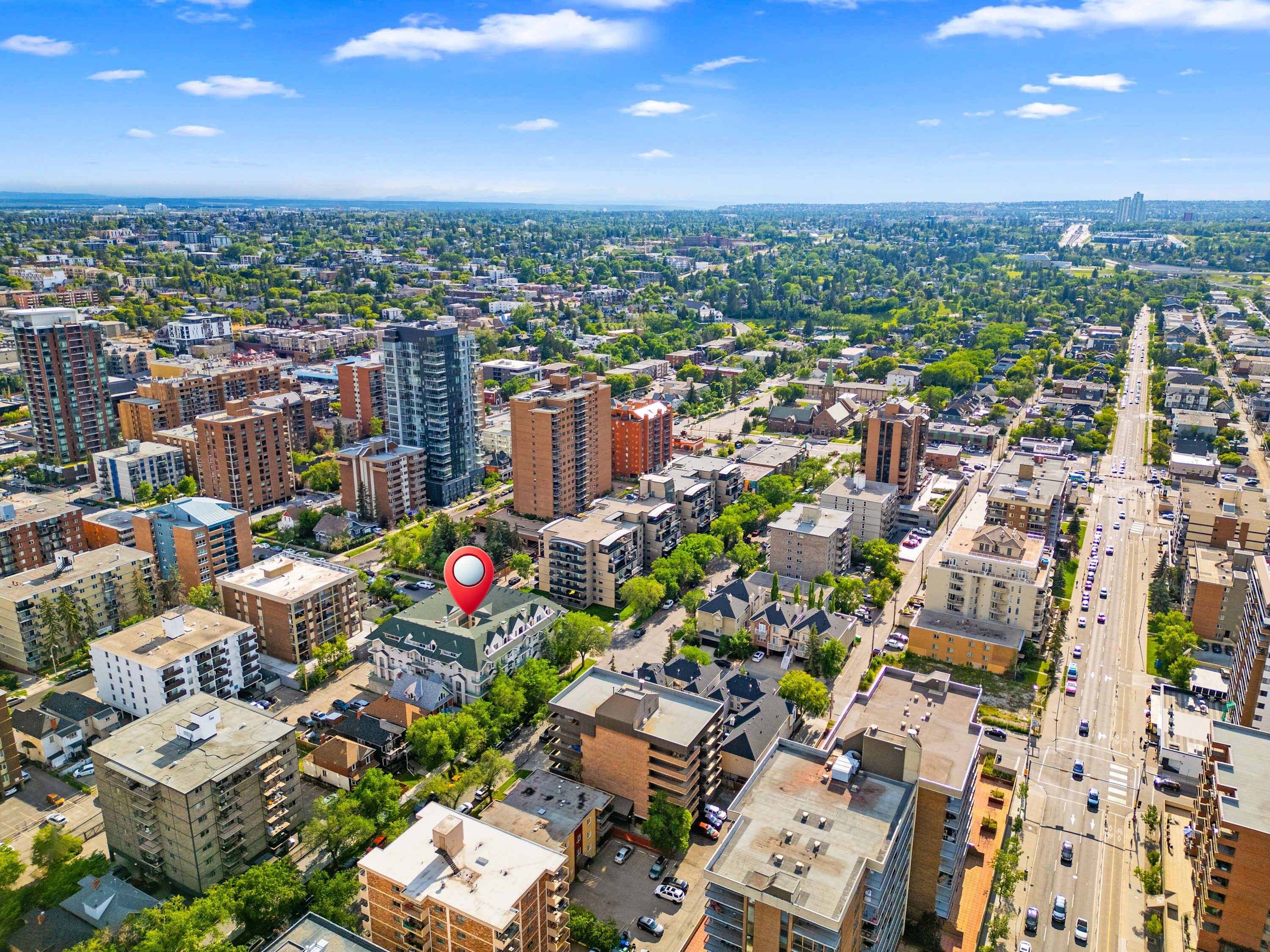 A high-rise urban area with dense residential buildings, a prominent church, and a clear view of the cityscape.