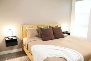 1 bedroom, desk, iron/ironing board, travel crib