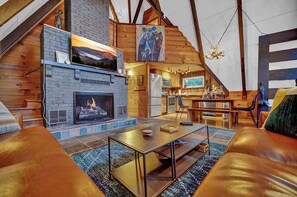 TV, fireplace, books, offices