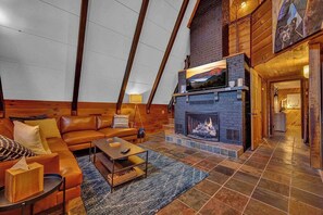 TV, fireplace, books, offices