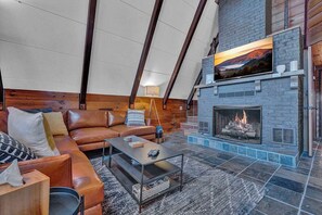 TV, fireplace, books, offices