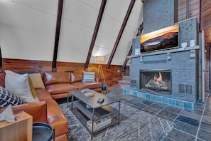 TV, fireplace, books, offices