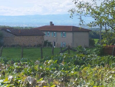 Hydrangea farmhouse with views of the surrounding hills