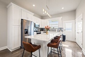 Fridge, microwave, oven, stovetop - Youngsville Stay•Two Kings+ En Suites by Complex (Youngsville)