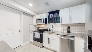 Fridge, microwave, stovetop, dishwasher - Affordable four bedroom Family Denver home (Denver)