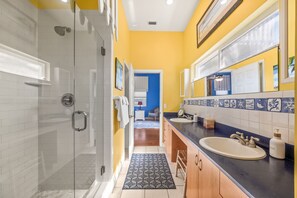 Shower, hair dryer, towels