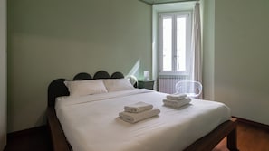 Departamento (1 Bedroom) | 1 habitación, tabla de planchar con plancha y ropa de cama