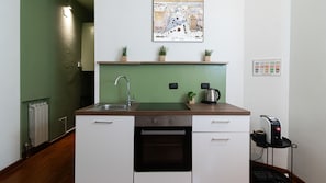 Departamento (1 Bedroom) | Cocineta privada | Horno, cafetera de espresso y tetera eléctrica