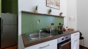 Departamento (1 Bedroom) | Cocineta privada | Horno, cafetera de espresso y tetera eléctrica