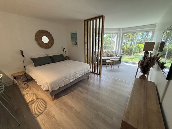 1 bedroom, desk, iron/ironing board, travel crib