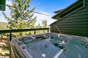 Condo, 4 Bedrooms | Outdoor spa tub