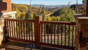 A wooden deck with a view of a mountainous landscape. - Grand Lodge - Three Bedroom Condo #301 - Ski-in/ski-out by Deer Valley Resort (Park City)