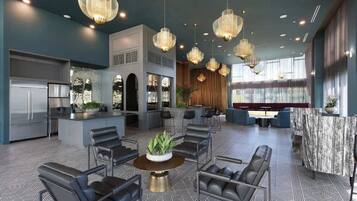 Eine moderne Hotelhalle mit einer zentralen Sitzecke, einer Bar und einem Billardtisch.