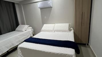 Apartamento premium | Cofres nos quartos, Wi-Fi de cortesia, roupa de cama