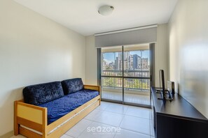 Basic Apartment | Living area | 32-inch Smart TV with digital channels