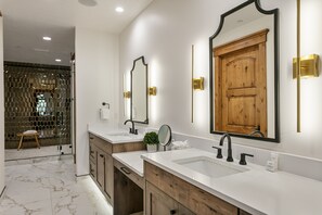 A modern bathroom with two sinks, wooden cabinets, and large mirrors. - 6565 Lookout Drive - Four Bedroom Condo with Spa by Deer Valley Resort (Park City)