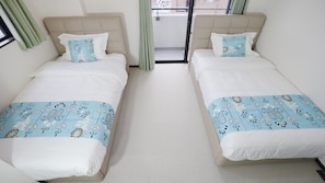 Twin Room, Balcony, City View | Desk, laptop workspace, blackout drapes, iron/ironing board