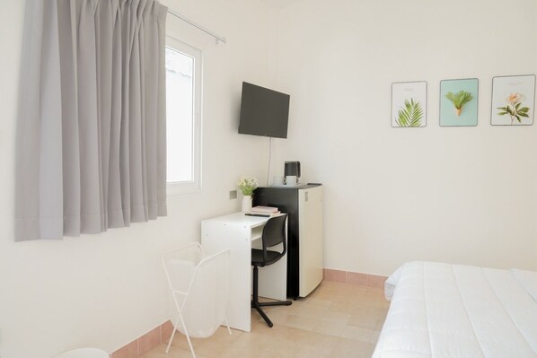 Desk, blackout curtains, iron/ironing board, free WiFi