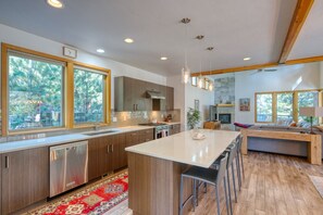 Fridge, stovetop, dishwasher, coffee/tea maker