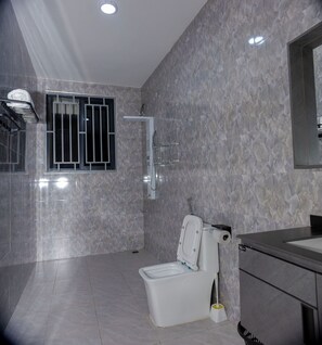 Shower, slippers, towels, soap