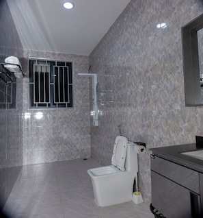 Shower, slippers, towels, soap