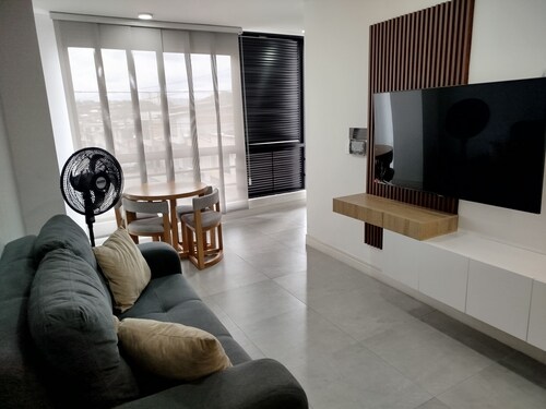 Cozy and beautiful apartments. Very modern finishesincludesbonito rooftop very centralized