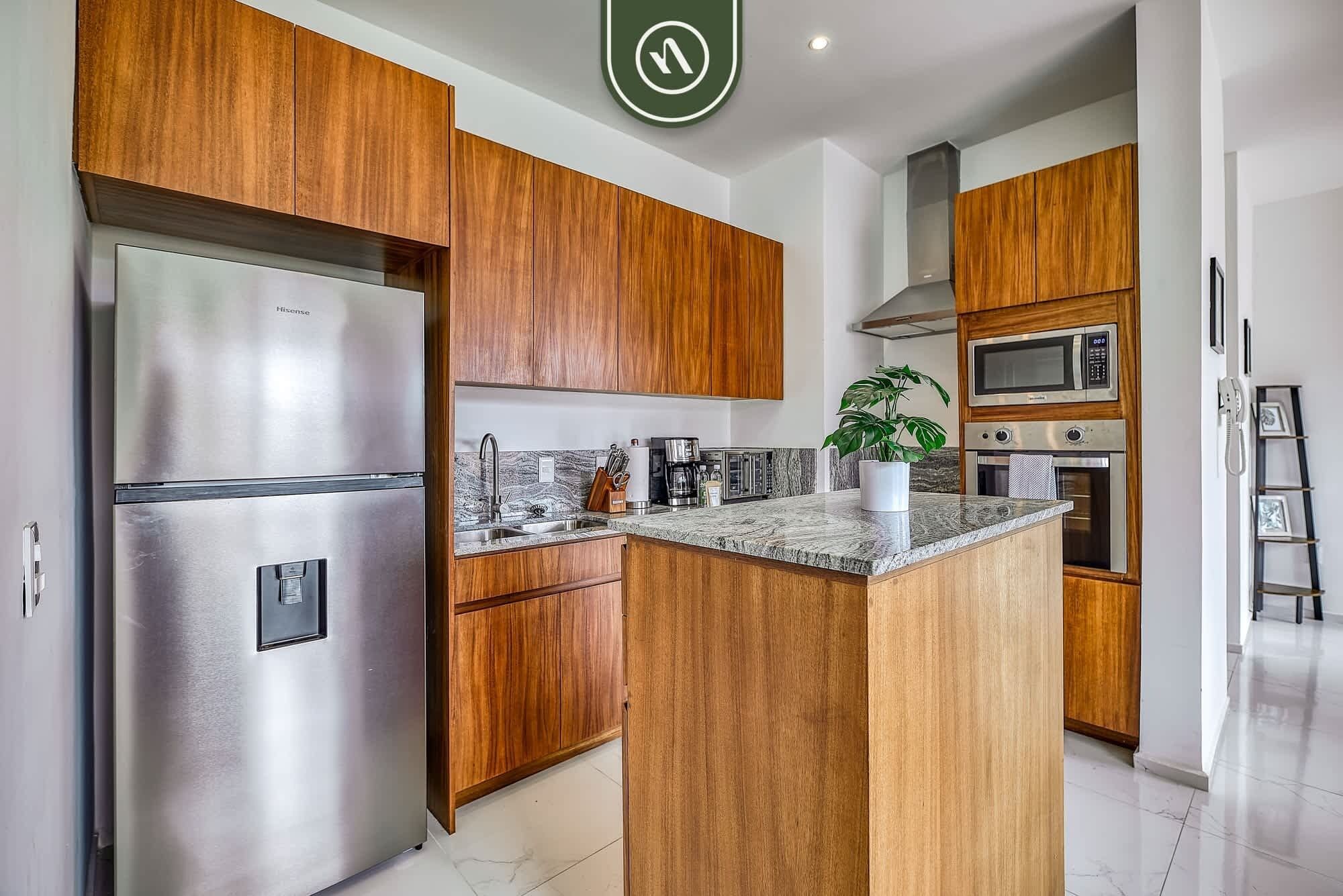 Departamento, varias camas, cocina (Grand Trianon 305) | Cocina privada | Comedor 