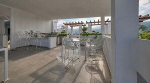 Apartment, 1 King Bed with Sofa bed, Pool Access (Grand Trianon 304) | Outdoor dining