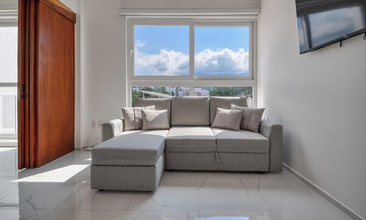 Appartement, 1 très grand lit et 1 canapé-lit, accès piscine (Grand Trianon 304) | Coin séjour