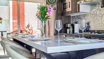 Apartment, Multiple Beds, Kitchen, Beach View (Pacifica Sol 302) | Private kitchen | Coffee/tea maker, dining tables