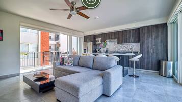 Apartment, Multiple Beds, Kitchen, Beach View (Pacifica Sol 302) | Living area | 42-inch flat-screen TV with digital channels