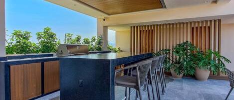 Apartment, 1 King Bed with Sofa bed, Jetted Tub, Ocean View (Maralma Indigo 306) | Outdoor dining