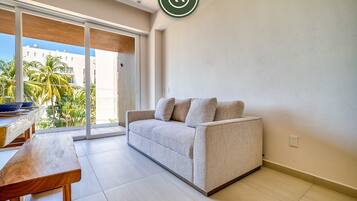 Apartment, 1 King Bed with Sofa bed, Kitchen, Ocean View (Maralma Indigo 306) | Living area | 42-inch flat-screen TV with digital channels