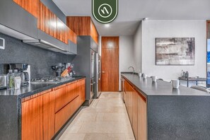 Condo, Multiple Beds, Pool Access, Ocean View (Palm on the Tree Unit 3) | Private kitchen - New 2BR Condo in Zona Romantica - Rooftop Pool (Puerto Vallarta)