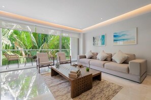 Apartment, Multiple Beds, Kitchen, Beach View (Bolongo F2-003) | Living area | 42-inch flat-screen TV with digital channels - Amazing Condo - Beach Access - Spa - Pool (Punta de Mita)