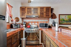 Apartment, Multiple Beds, Pool Access, Ocean View (303-VistadelSol) | Private kitchen | Coffee/tea maker, dining tables