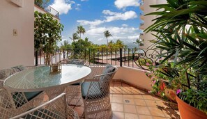 Apartment, Multiple Beds, Kitchen, Ocean View (303-VistadelSol) | Outdoor dining