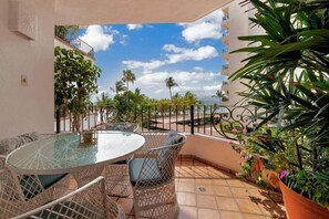 Apartment, Multiple Beds, Pool Access, Ocean View (303-VistadelSol) | Outdoor dining