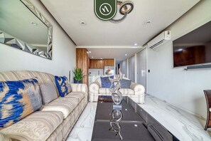 Apartment, Multiple Beds, Balcony, City View (Quadrant 2205) | Living area