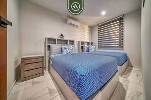 Apartment, Multiple Beds, Balcony, City View (Quadrant 2205) | 2 bedrooms, individually decorated, individually furnished, bed sheets