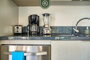 Apartment, 1 Queen Bed, Kitchen, Beach View (Pavilion 604) | Private kitchen | Coffee/tea maker, dining tables