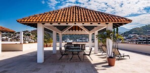 Outdoor dining - Beach Front Building 2Br Condo-balcony-beach-pool (Puerto Vallarta)