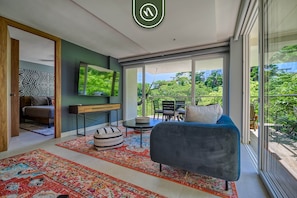 Apartment, Multiple Beds, Kitchen, Ocean View (Sea View Residences 302) | Living area | 42-inch flat-screen TV with digital channels