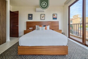 Apartment, Multiple Beds, Kitchen, Ocean View (The Canuva Lux 204) | 3 bedrooms, individually decorated, individually furnished
