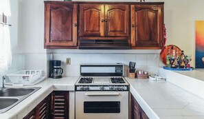 Condo, Multiple Beds, Pool Access, Ocean View (604 Vista del Sol) | Private kitchen | Coffee/tea maker, dining tables