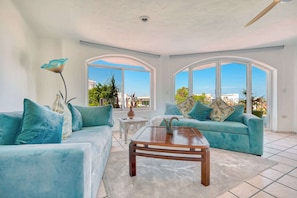 Apartment, Multiple Beds, Kitchen, Ocean View (Punta Diamante 4) | Living area | 42-inch flat-screen TV with digital channels