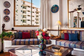 Apartment, Multiple Beds, Kitchen, Ocean View (802-VistadelSol) | Living area | 42-inch flat-screen TV with digital channels