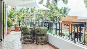 Apartment, Multiple Beds, Pool Access, Ocean View (214-VistadelSol) | Outdoor dining
