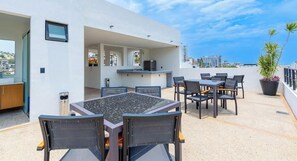 Apartment, Multiple Beds, Balcony, Ocean View (Serenity 302) | Outdoor dining