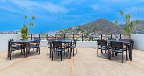 Outdoor dining - Amazing 2BR Condo in Romantic Zone - Rooftop Pool (Puerto Vallarta)